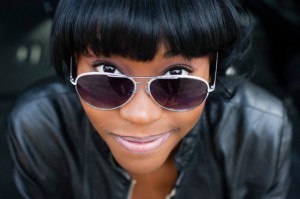Close up portrait of young woman in sunglasses